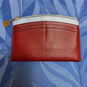 Mulberry clutch with exterior card pockets, zipper closure, good condition